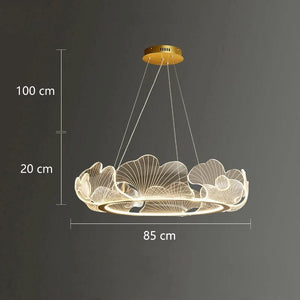 Floral LED pendant light fixture with a gold ceiling canopy and multiple flower-shaped glass shades, shown with dimension labels indicating 100 cm height, 20 cm shade depth, and 85 cm width on a dark gray background.