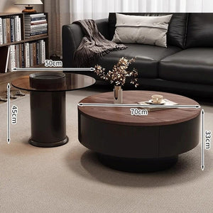 Modern round coffee table and matching cylindrical side table in a living room setting, with overlaid dimension labels showing 70cm width, 33cm height, 45cm side table height, and 50cm side table width.