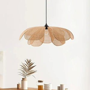 Woven pendant light fixture on a white background