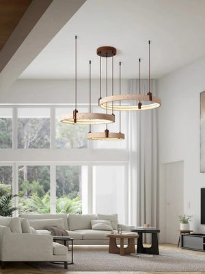 Modern living room with pendant lights and large windows