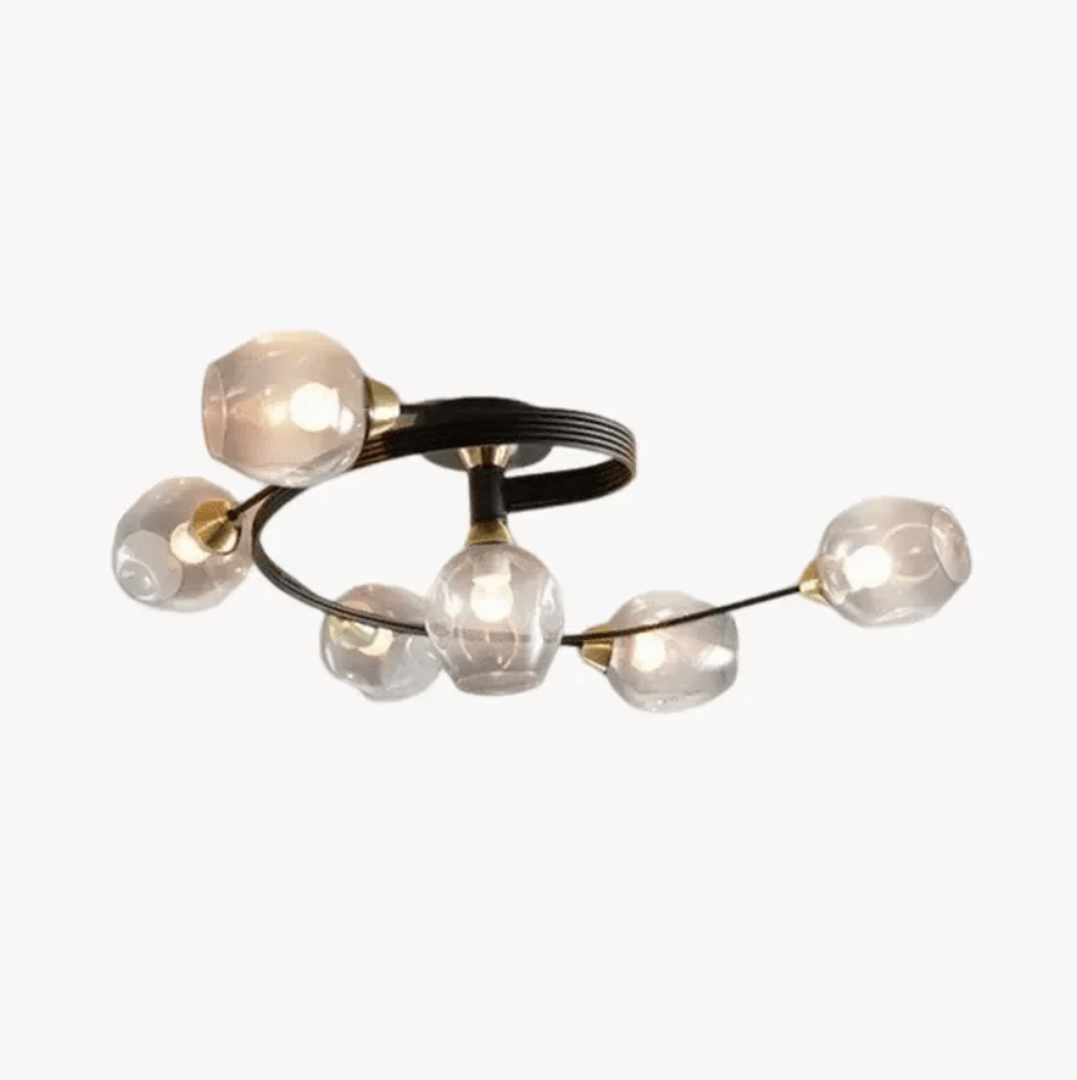 A modern semi-flush mount ceiling light fixture featuring six faceted, clear glass globes attached to a curved black metal frame with small gold accents, shown against a plain white background.